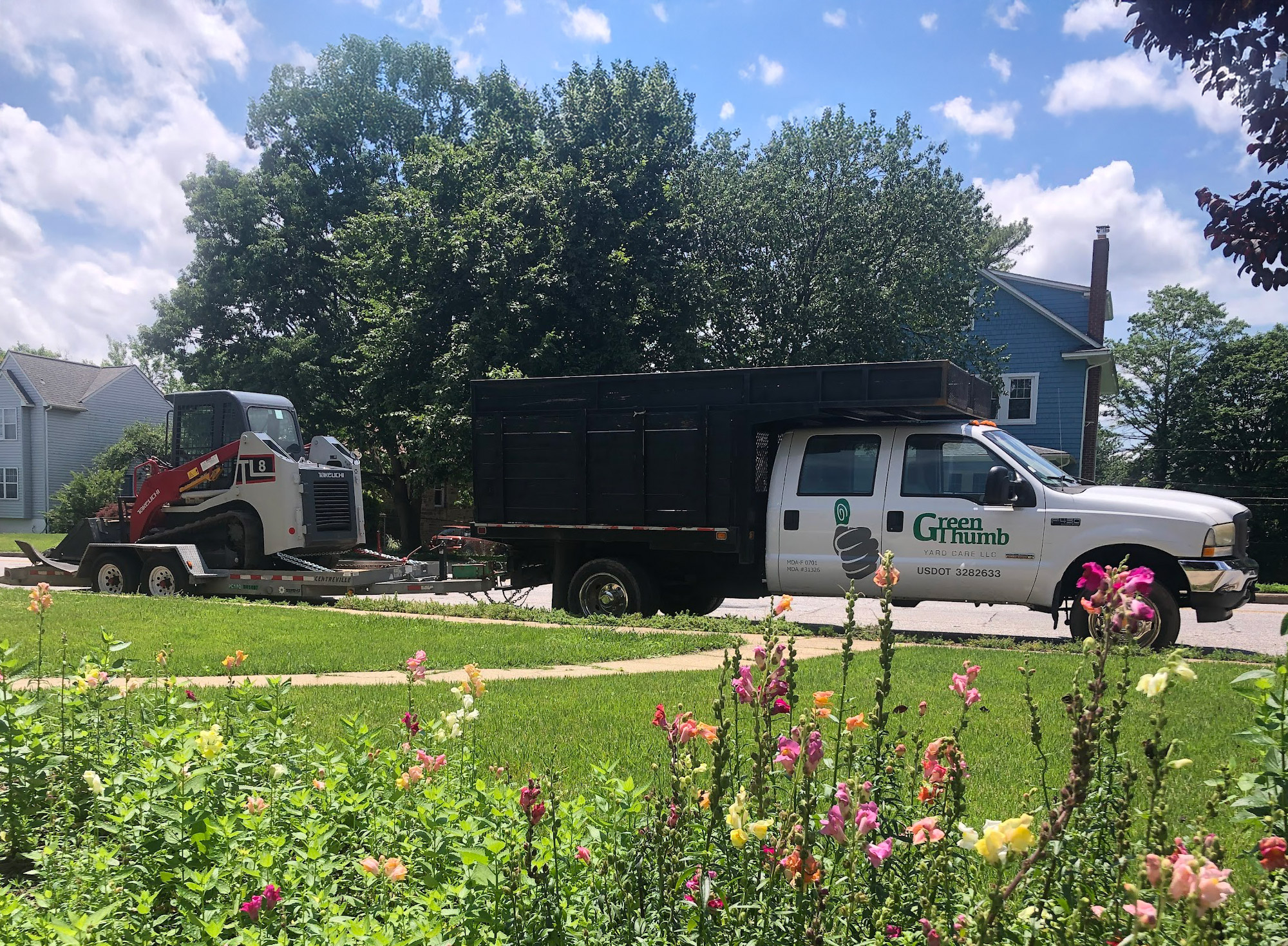 Green Thumb Yard Care Truck and Skid Steer